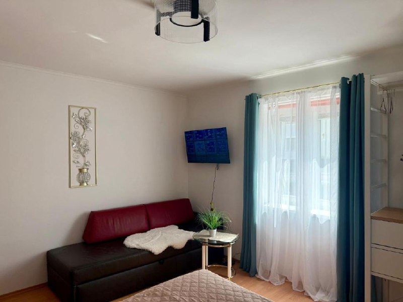 Sofa and window Apartment D01