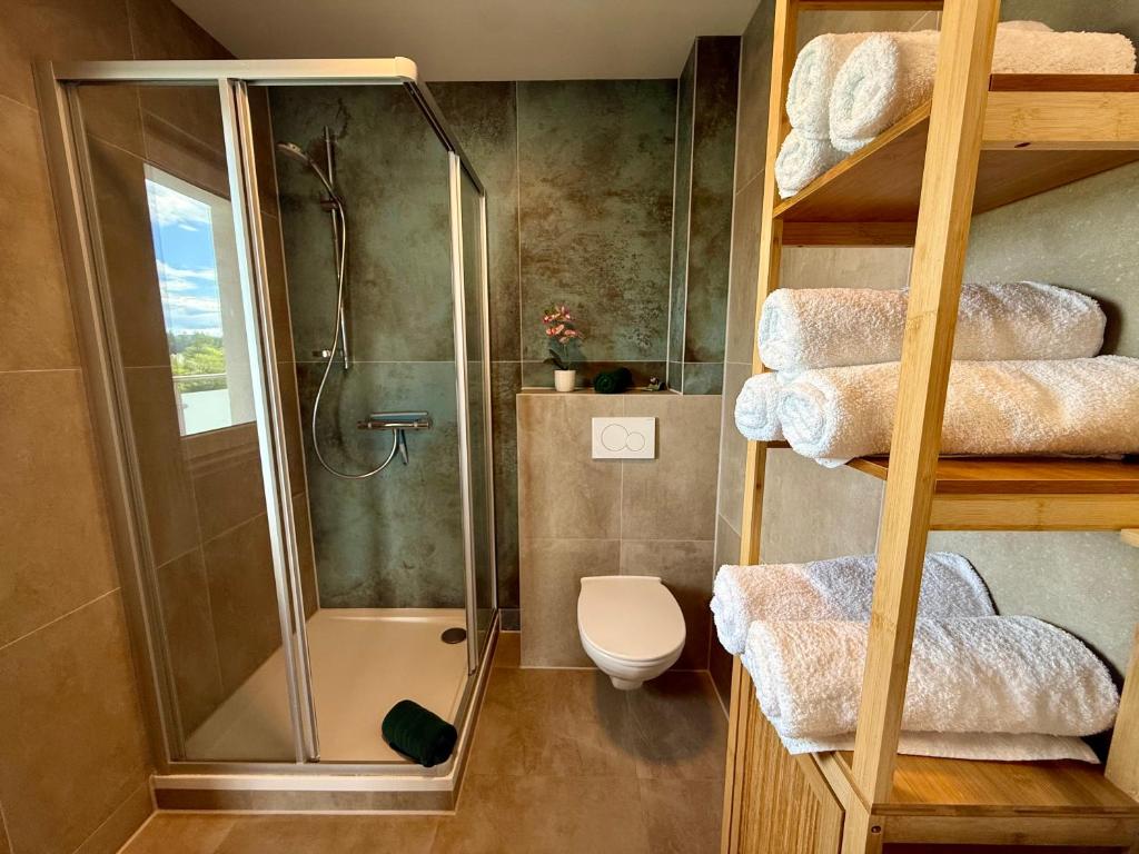 Bathroom with shower and WC Top 1