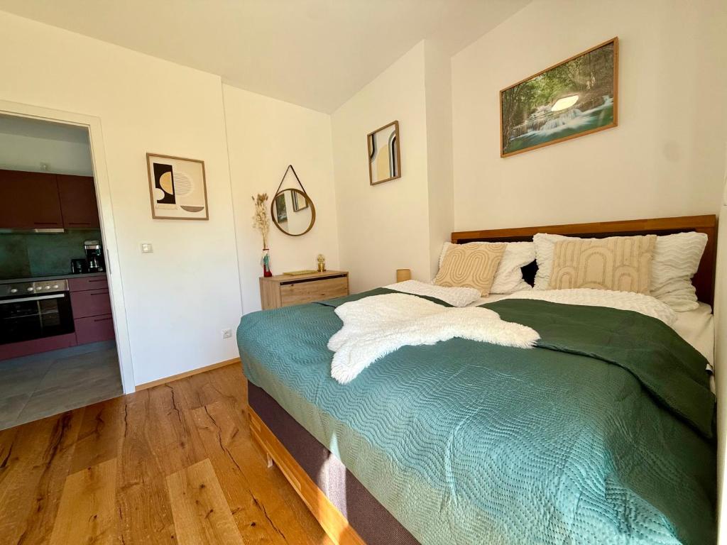 Bedroom with green bedding Top 1
